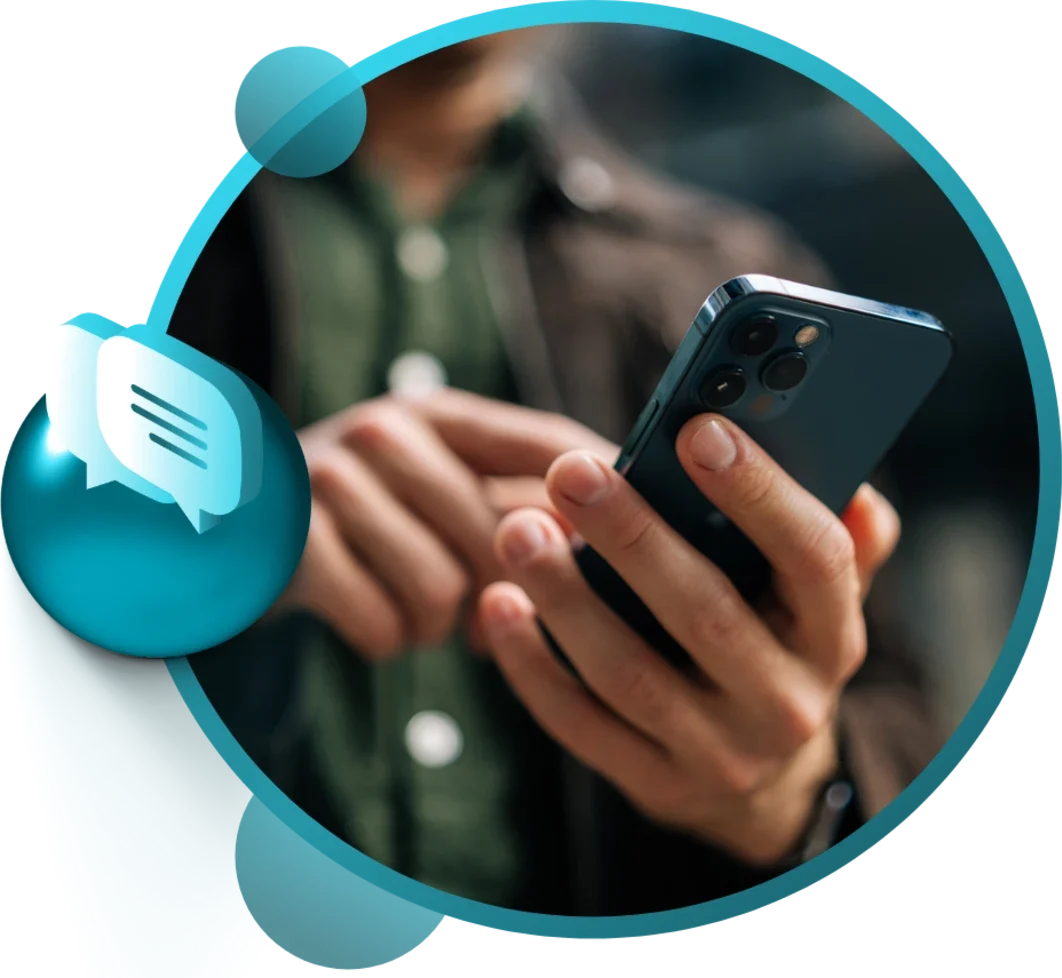 Person holding a smartphone with a messaging icon overlay, indicating communication and connectivity.