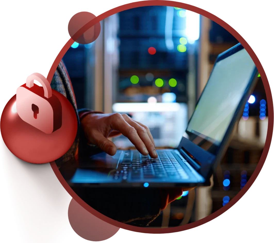 A person typing on a laptop with a security lock icon overlay, symbolising cybersecurity and data protection.