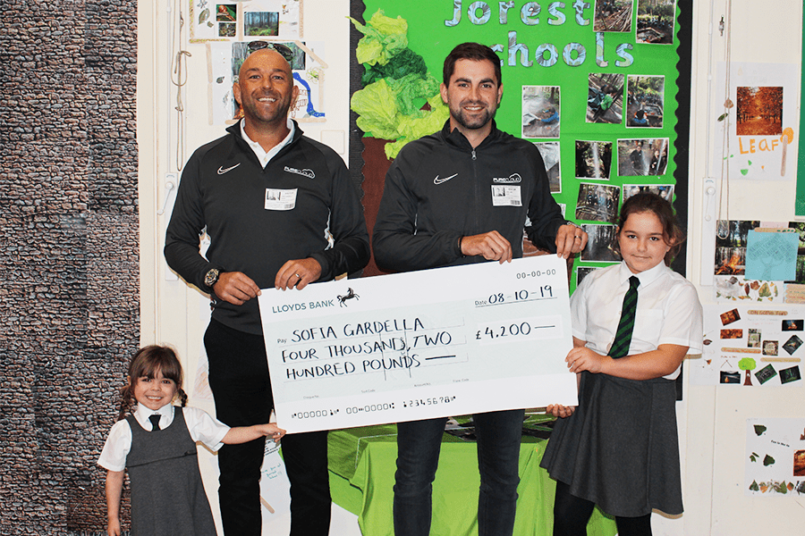 Jamie Lake presenting a cheque for the ‘Sofia Is Still Smiling’ initiative.